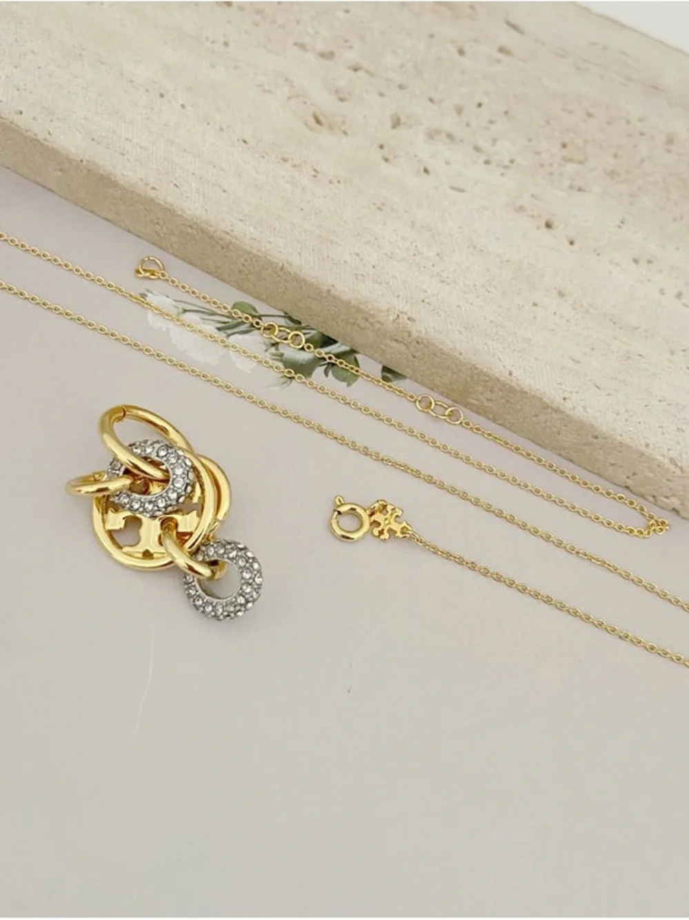 Tory Burch Gold-Tone Interlocking Circle Pendant with Crystal Accents